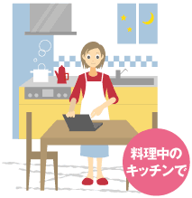 料理中のキッチンで